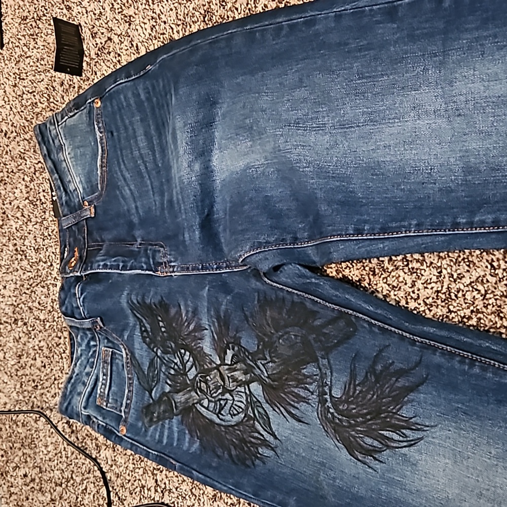 Fashion Nova jeans. Size 11. New with tag. Has a drawing on the front on 1 side